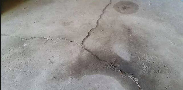 Concrete Garage Floor Repair and Leveling Services