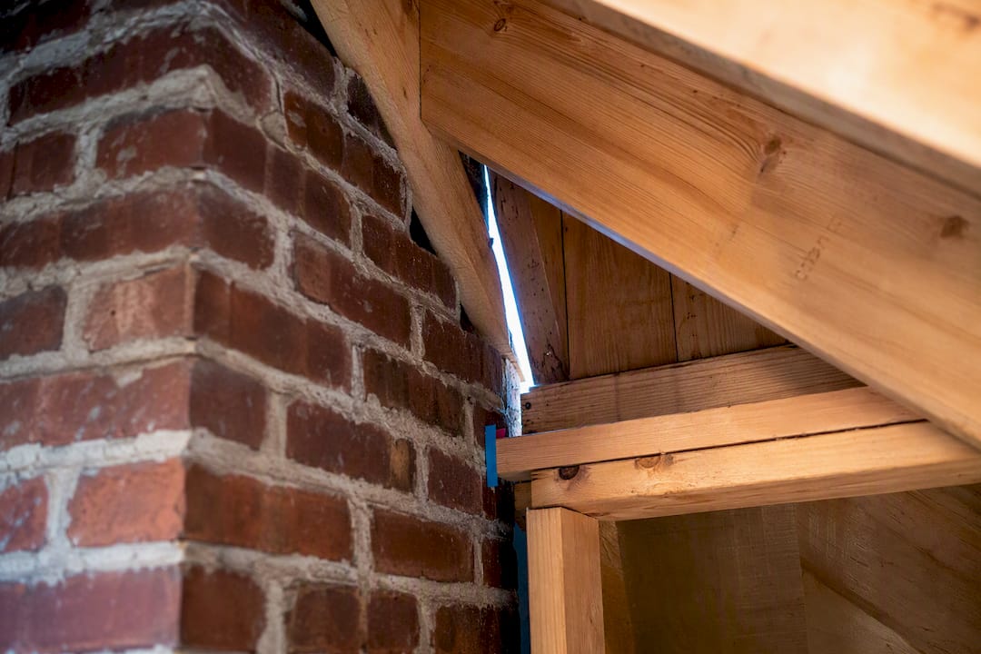 Attic gap around chimney framing